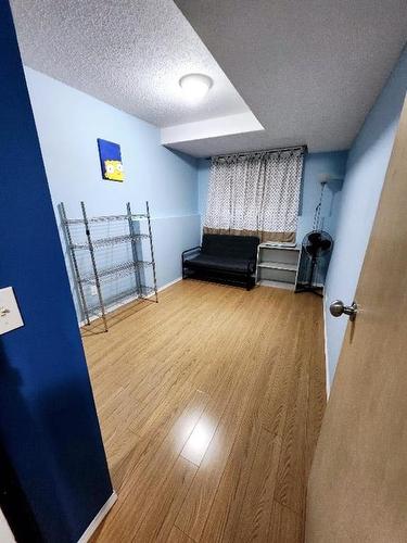 E-1403 44 Street Se, Calgary, AB - Indoor Photo Showing Other Room