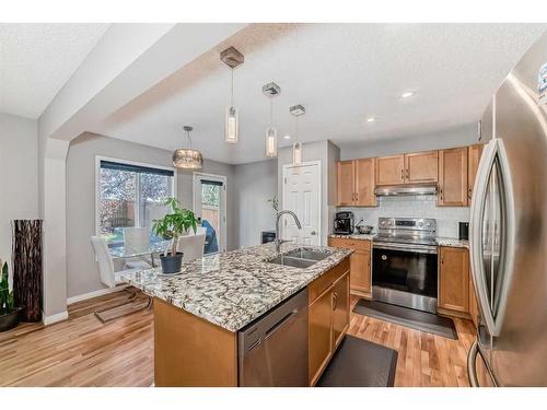 2 Evansbrooke Manor Nw, Calgary, AB - Indoor Photo Showing Kitchen With Stainless Steel Kitchen With Double Sink With Upgraded Kitchen