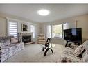 639 1 Street North, Vulcan, AB  - Indoor Photo Showing Living Room With Fireplace 