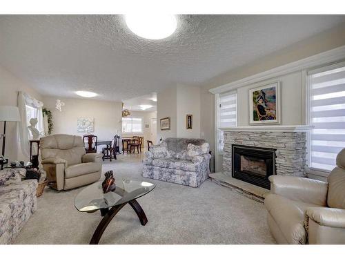 639 1 Street North, Vulcan, AB - Indoor Photo Showing Living Room With Fireplace