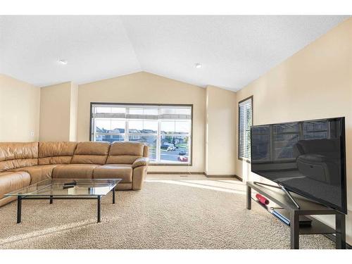 245 Chapalina Mews Se, Calgary, AB - Indoor Photo Showing Living Room