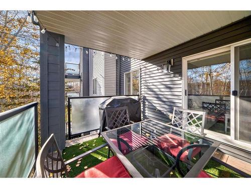 312-20 Sierra Morena Mews Sw, Calgary, AB - Outdoor With Deck Patio Veranda With Exterior