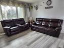 444 Penworth Rise Se, Calgary, AB  - Indoor Photo Showing Living Room 