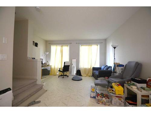 65 Walden Se, Calgary, AB - Indoor Photo Showing Living Room