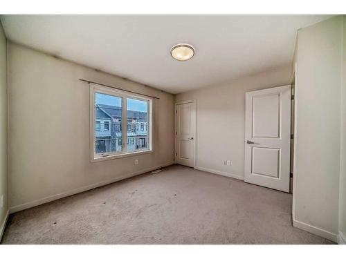 65 Walden Walk Se, Calgary, AB - Indoor Photo Showing Other Room