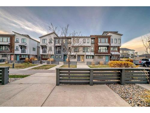 65 Walden Walk Se, Calgary, AB - Outdoor With Balcony With Facade