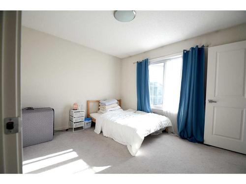 65 Walden Se, Calgary, AB - Indoor Photo Showing Bedroom