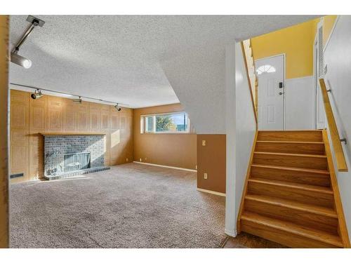 336 Cedarille Crescent Sw, Calgary, AB - Indoor With Fireplace