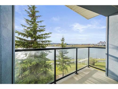 208-120 Country Village Circle Ne, Calgary, AB - Outdoor With Body Of Water With Balcony With View