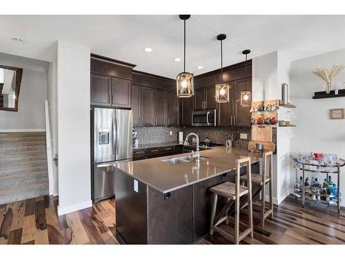 159 Silverado Plains Park Sw, Calgary, AB - Indoor Photo Showing Kitchen With Stainless Steel Kitchen With Double Sink With Upgraded Kitchen