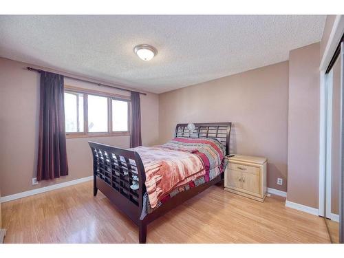 36 Taylor Way Se, Airdrie, AB - Indoor Photo Showing Bedroom