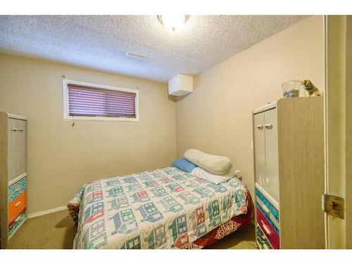 36 Taylor Way Se, Airdrie, AB - Indoor Photo Showing Bedroom