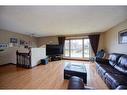 36 Taylor Way Se, Airdrie, AB  - Indoor Photo Showing Living Room 