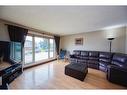 36 Taylor Way Se, Airdrie, AB  - Indoor Photo Showing Living Room 