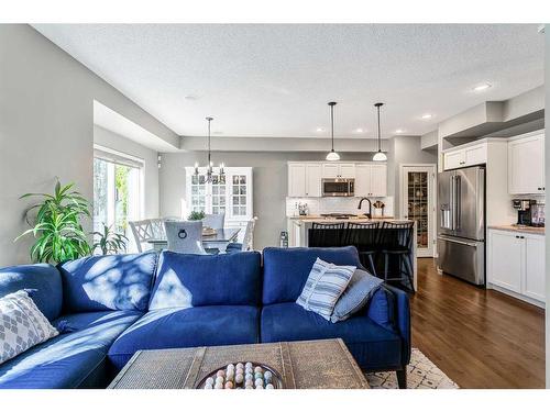 264 Brightonwoods Gardens Se, Calgary, AB - Indoor Photo Showing Living Room