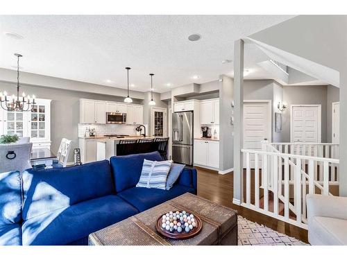 264 Brightonwoods Gardens Se, Calgary, AB - Indoor Photo Showing Living Room