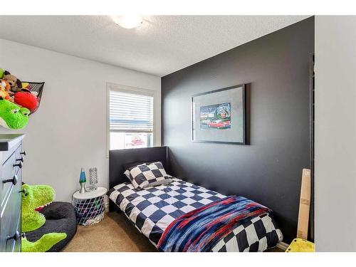 264 Brightonwoods Gardens Se, Calgary, AB - Indoor Photo Showing Bedroom