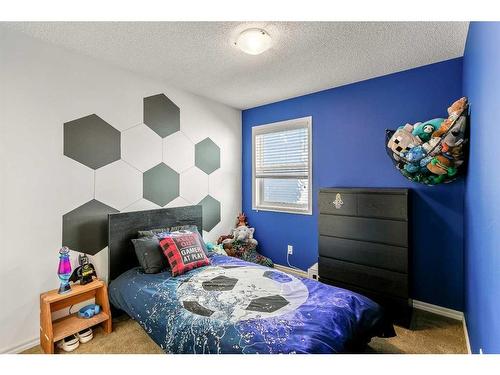 264 Brightonwoods Gardens Se, Calgary, AB - Indoor Photo Showing Bedroom