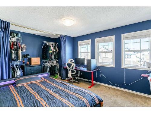 264 Brightonwoods Gardens Se, Calgary, AB - Indoor Photo Showing Bedroom