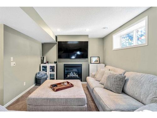 264 Brightonwoods Gardens Se, Calgary, AB - Indoor With Fireplace