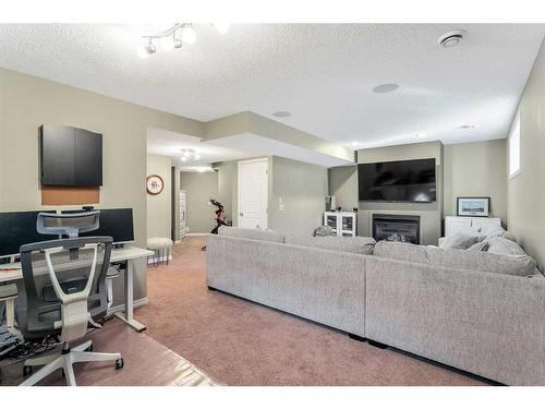 264 Brightonwoods Gardens Se, Calgary, AB - Indoor With Fireplace