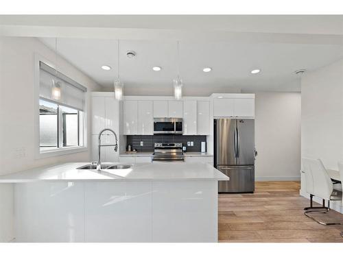 3108-410 Seton Passage Se, Calgary, AB - Indoor Photo Showing Kitchen With Stainless Steel Kitchen With Double Sink With Upgraded Kitchen