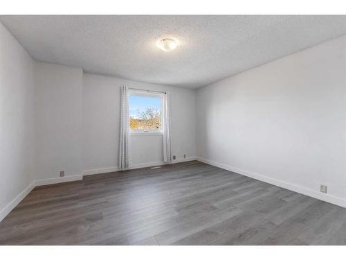 345 Falshire Drive Ne, Calgary, AB - Indoor Photo Showing Other Room