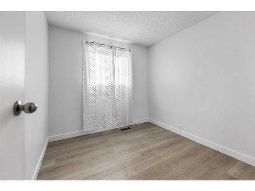 345 Falshire Drive Ne, Calgary, AB - Indoor Photo Showing Other Room