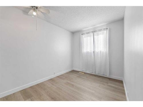 345 Falshire Drive Ne, Calgary, AB - Indoor Photo Showing Other Room