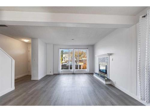 345 Falshire Drive Ne, Calgary, AB - Indoor Photo Showing Living Room