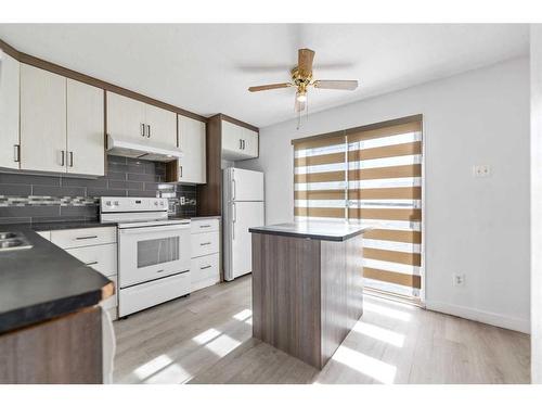 345 Falshire Drive Ne, Calgary, AB - Indoor Photo Showing Kitchen