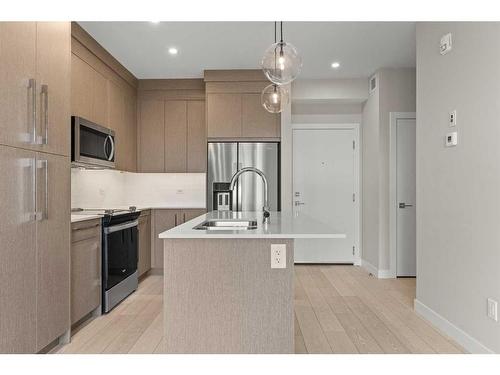 2212-395 Skyview Parkway Ne, Calgary, AB - Indoor Photo Showing Kitchen With Stainless Steel Kitchen With Double Sink With Upgraded Kitchen