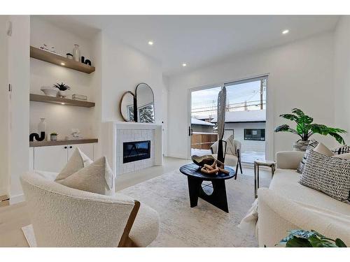 2414 32 Street Sw, Calgary, AB - Indoor Photo Showing Living Room With Fireplace