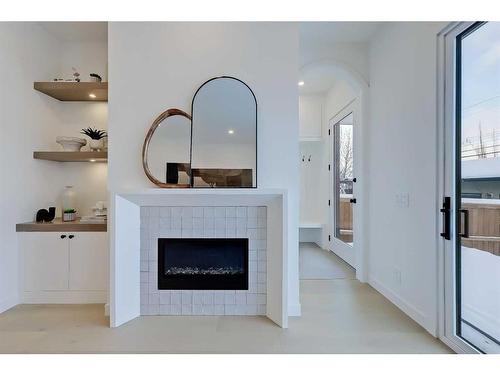 2414 32 Street Sw, Calgary, AB - Indoor Photo Showing Living Room With Fireplace