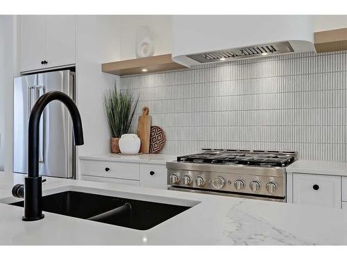 2414 32 Street Sw, Calgary, AB - Indoor Photo Showing Kitchen With Double Sink