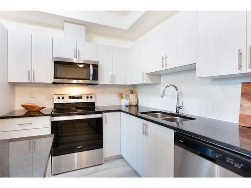 4411-15 Sage Meadows Landing Nw, Calgary, AB - Indoor Photo Showing Kitchen With Double Sink With Upgraded Kitchen