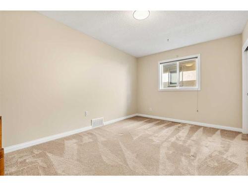 38 Woodbriar Place Sw, Calgary, AB - Indoor Photo Showing Other Room