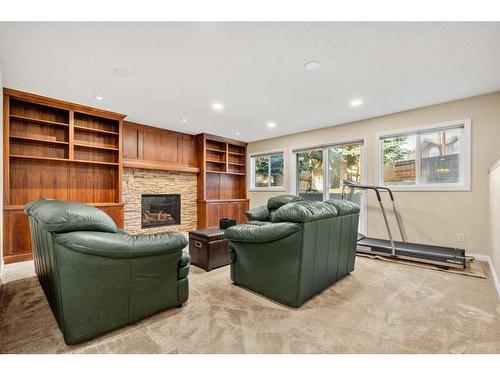 38 Woodbriar Place Sw, Calgary, AB - Indoor With Fireplace