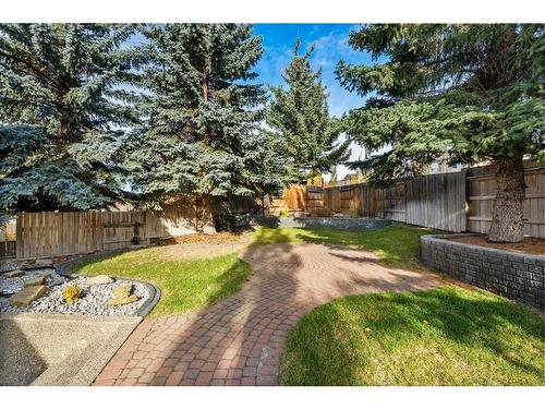 38 Woodbriar Place Sw, Calgary, AB - Outdoor With Backyard