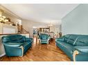 38 Woodbriar Place Sw, Calgary, AB  - Indoor Photo Showing Living Room 