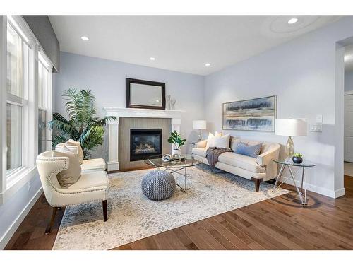 80 Evansridge View Nw, Calgary, AB - Indoor Photo Showing Living Room With Fireplace