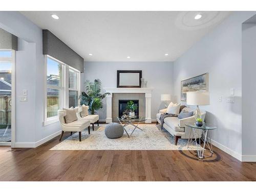 80 Evansridge View Nw, Calgary, AB - Indoor Photo Showing Living Room With Fireplace