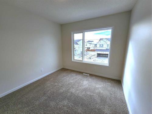 116 Setonstone Gardens Se, Calgary, AB - Indoor Photo Showing Other Room