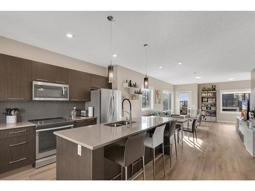 701-218 Sherwood Square Nw, Calgary, AB - Indoor Photo Showing Kitchen With Stainless Steel Kitchen With Double Sink With Upgraded Kitchen