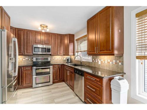 436 Strathcona Mews Sw, Calgary, AB - Indoor Photo Showing Kitchen With Stainless Steel Kitchen