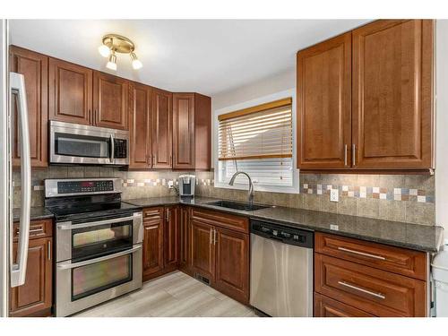 436 Strathcona Mews Sw, Calgary, AB - Indoor Photo Showing Kitchen With Stainless Steel Kitchen