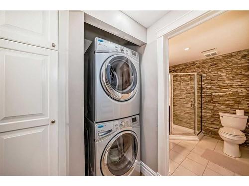 125 Cougarstone Place Sw, Calgary, AB - Indoor Photo Showing Laundry Room