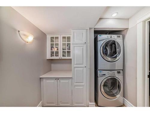 125 Cougarstone Place Sw, Calgary, AB - Indoor Photo Showing Laundry Room