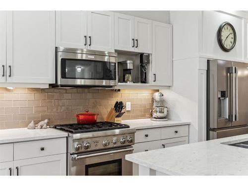 89 Somme Boulevard Sw, Calgary, AB - Indoor Photo Showing Kitchen With Upgraded Kitchen