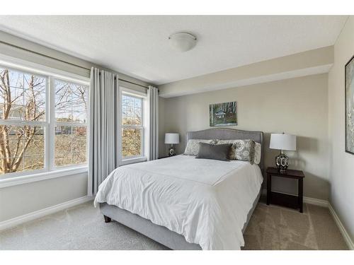 89 Somme Boulevard Sw, Calgary, AB - Indoor Photo Showing Bedroom